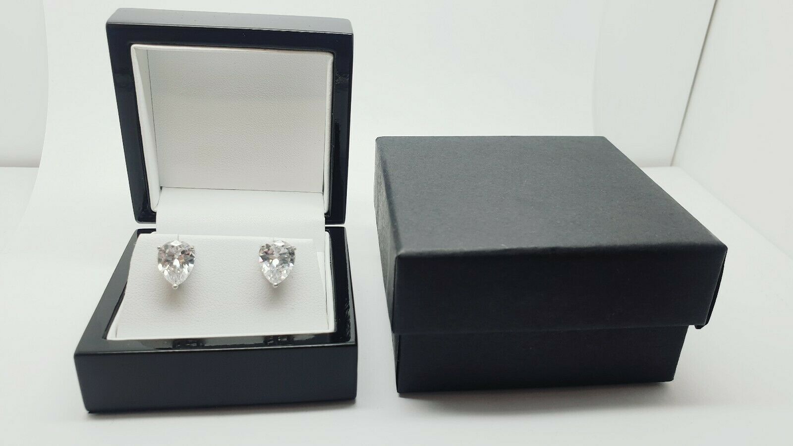 White gold finish Pear Cut Created diamond Stud earrings