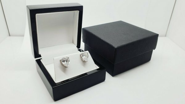 White gold finish Pear Cut Created diamond Stud earrings