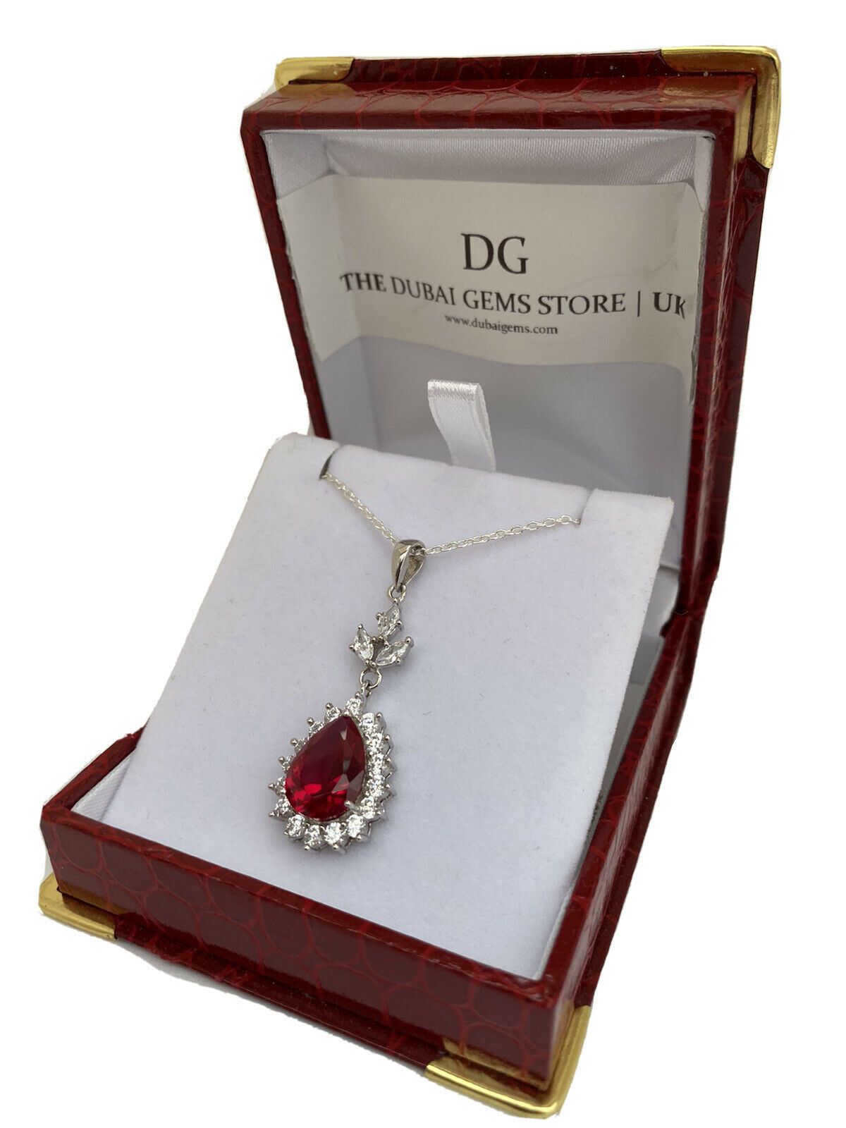 White gold finish pear cut red ruby created diamond pendant