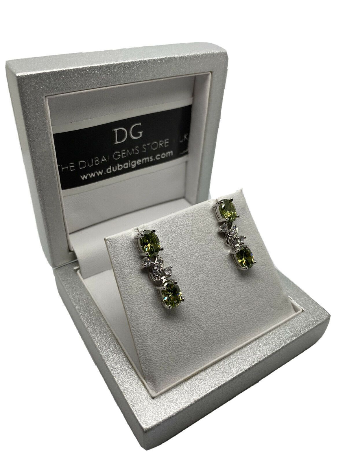 White gold finish peridot oval cut Hugs And Kisses Earrings