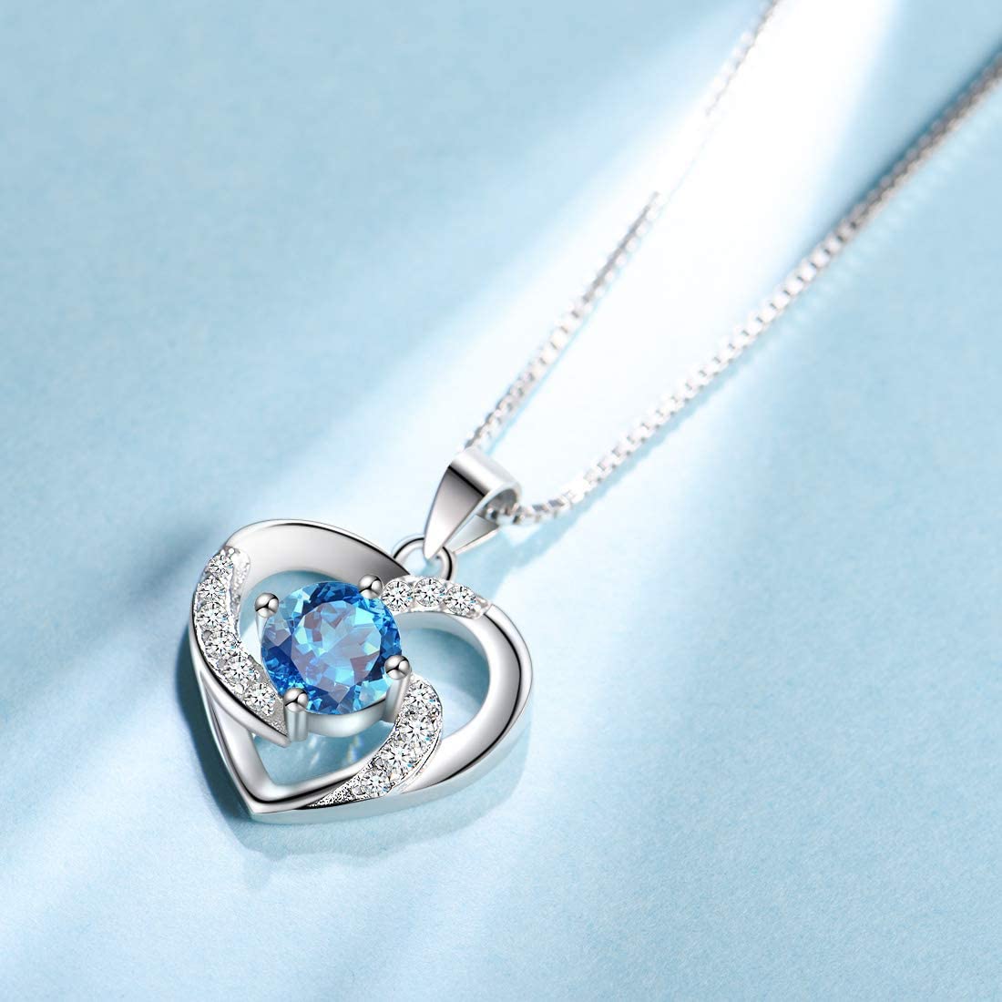 Amour – WHITE GOLD FINISH 925 Sterling Silver Round Cut Blue Topaz Created Diamond Heart Swirl Necklace