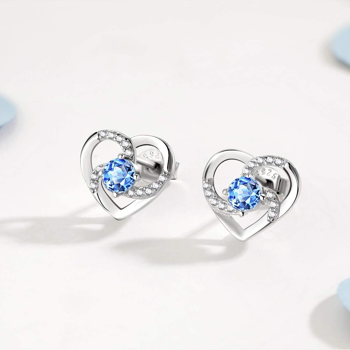 Amour – WHITE GOLD FINISH 925 Sterling Silver Round Cut Blue Topaz Created Diamond Heart Swirl Earrings