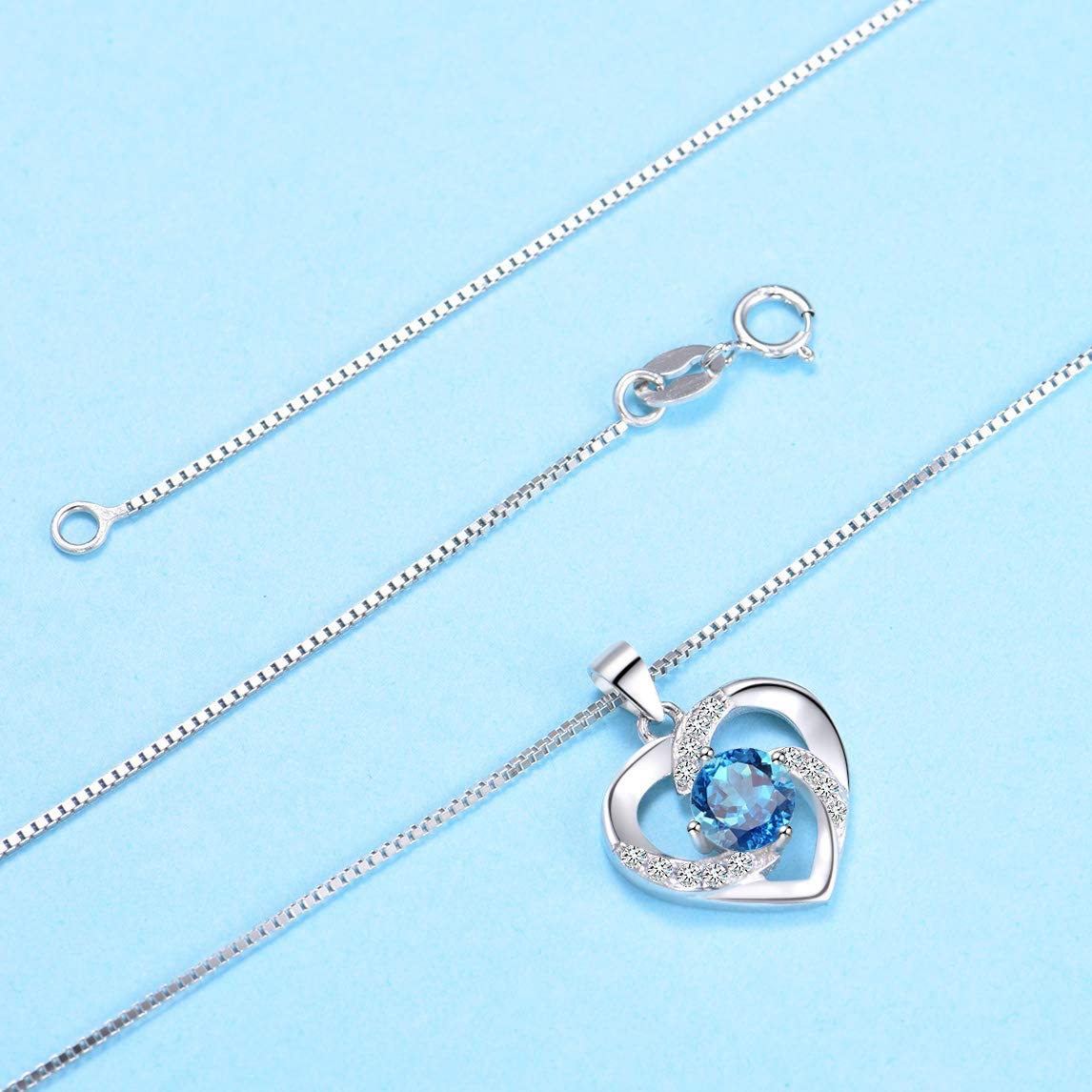 Amour – WHITE GOLD FINISH 925 Sterling Silver Round Cut Blue Topaz Created Diamond Heart Swirl Necklace