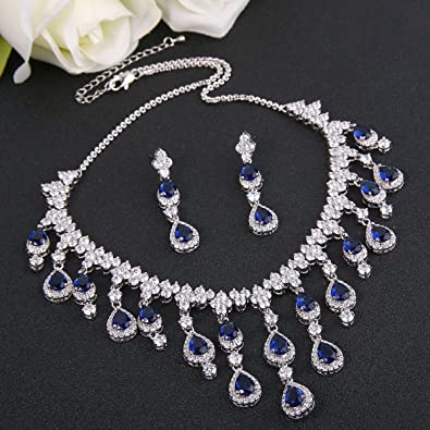 White gold finish pear cut sapphire and created diamond necklace