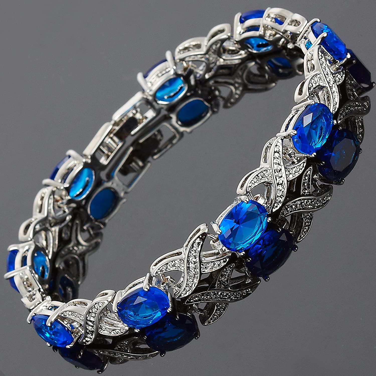 Love & Kisses Blue Sapphire Tennis Bracelet with Oval Cut Gemstones