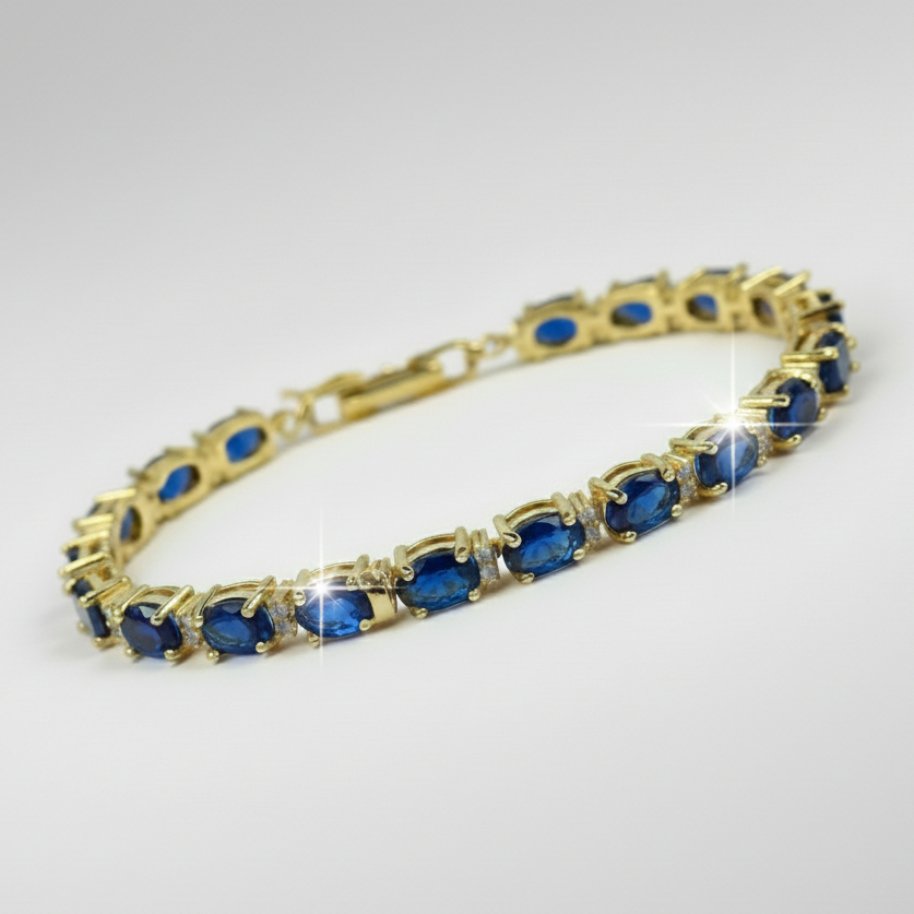 Isabella Blue Sapphire and Created Diamond Tennis Bracelet in Yellow Gold finish