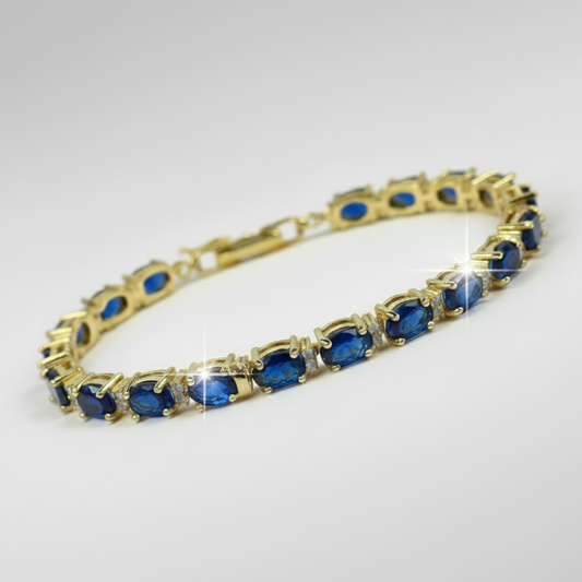 Isabella Blue Sapphire and Created Diamond Tennis Bracelet in Yellow Gold finish