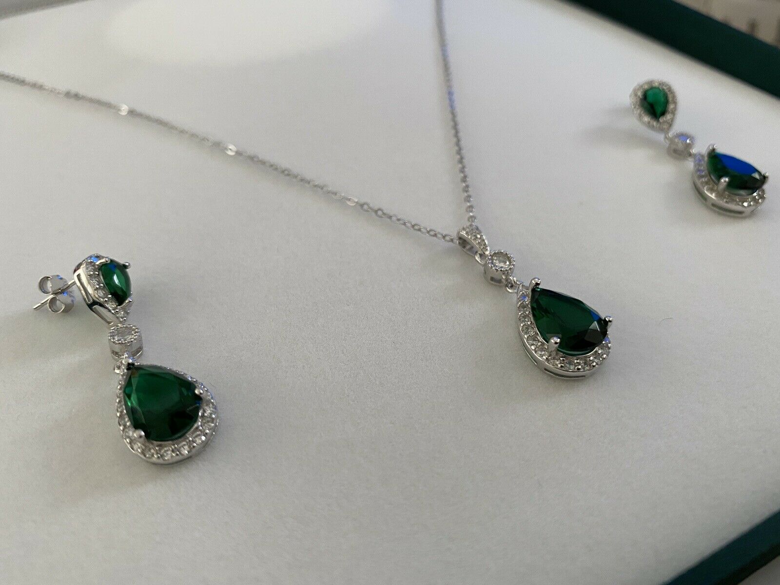 White gold finish Emerald And created diamond pearcut necklace and earrings