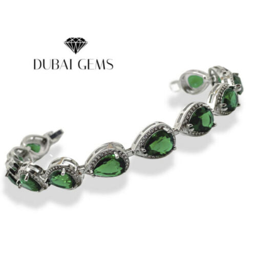 White gold finish Emerald and created diamonds pear cut bracelet