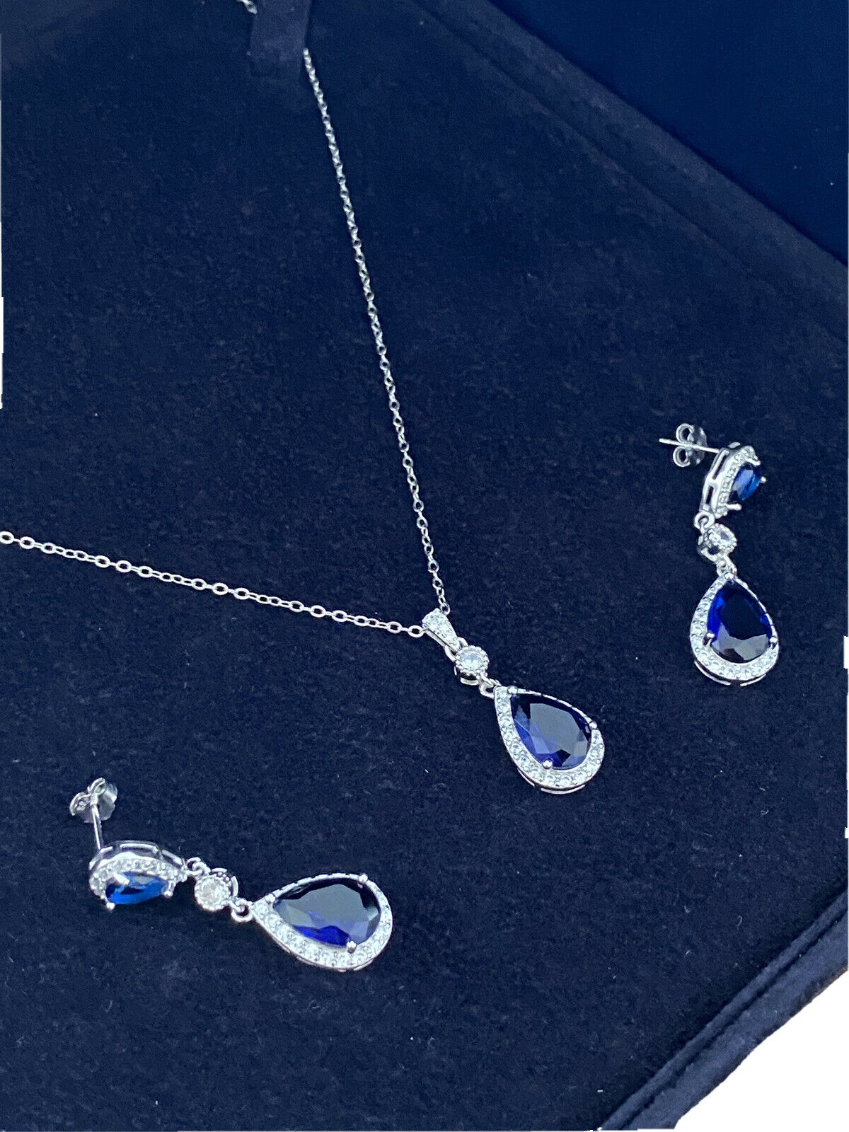 White Gold Finish Sapphire created diamond pear cut necklace and earrings set