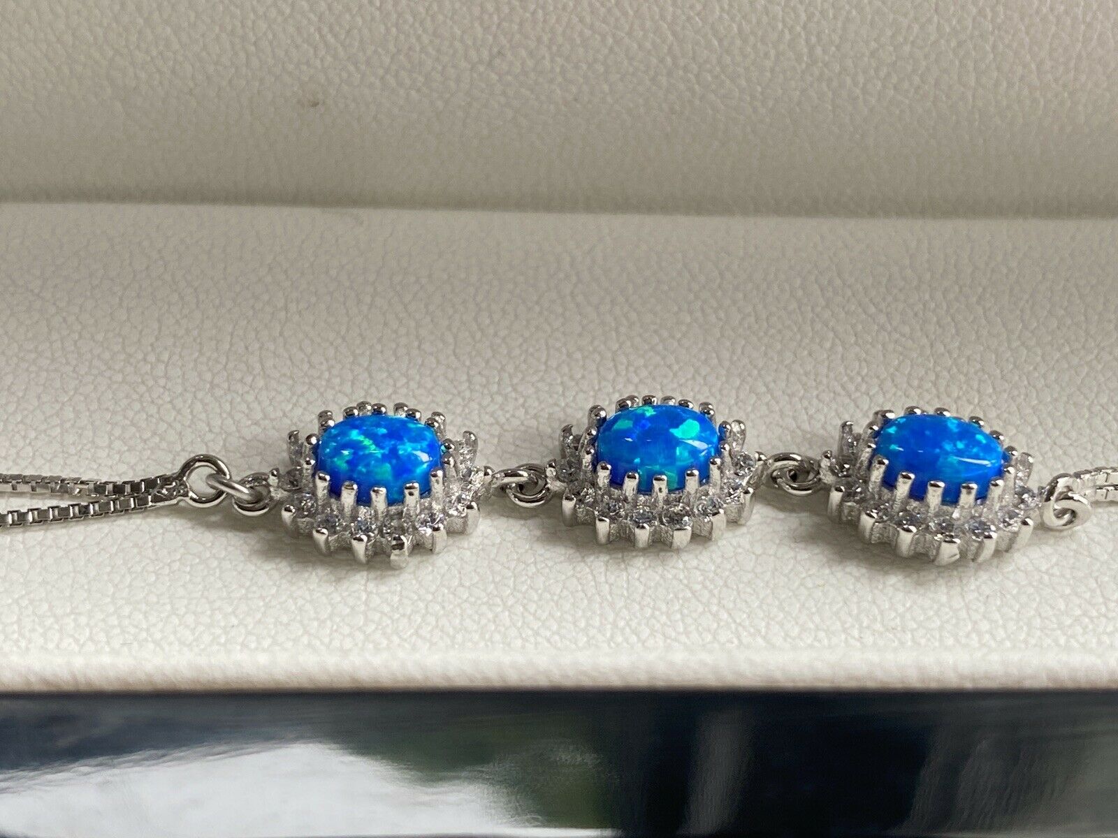 White gold finish Turquoise And Created Diamond Oval Bracelet