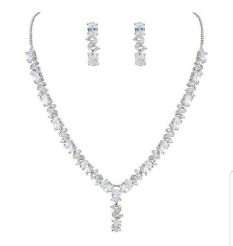 White gold finish created diamond earrings and necklace set