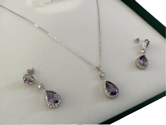 White gold finish amethyst And created diamond pearcut necklace And earrings