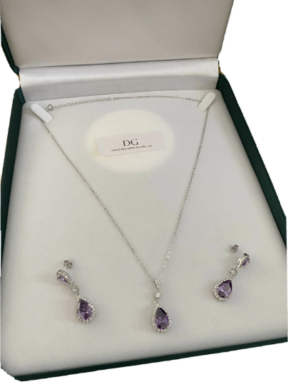 White gold finish amethyst And created diamond pearcut necklace And earrings