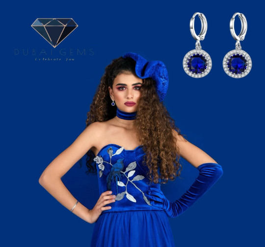 White gold finish blue sapphire and created diamond round cut droplet earrings