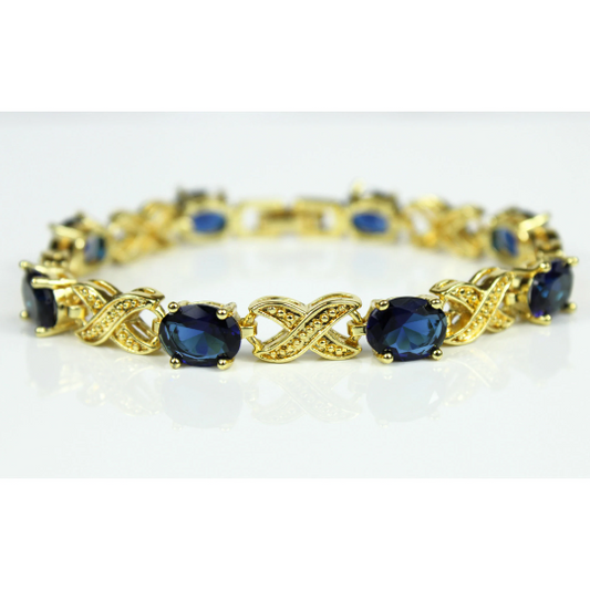 YELLOW GOLD FINISH Blue Sapphire “Love and Kisses” Bracelet