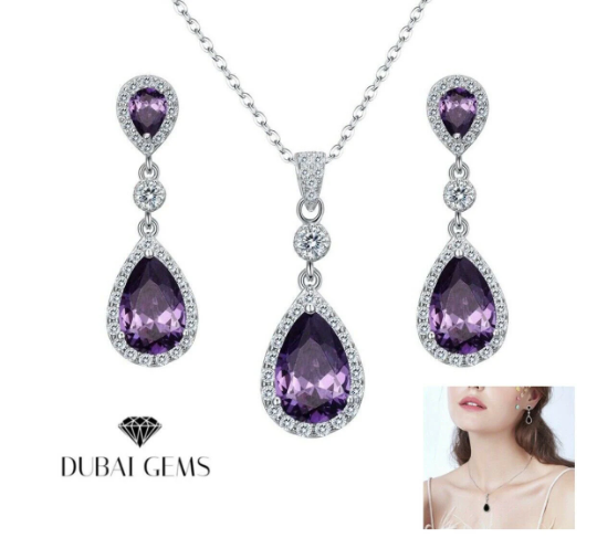 White gold finish amethyst And created diamond pearcut necklace And earrings