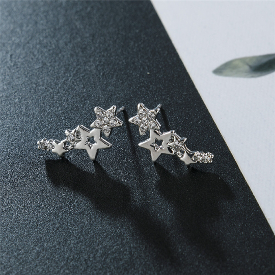 WHITE GOLD FINISH Star Hollow Design Created Diamond Stud Earrings