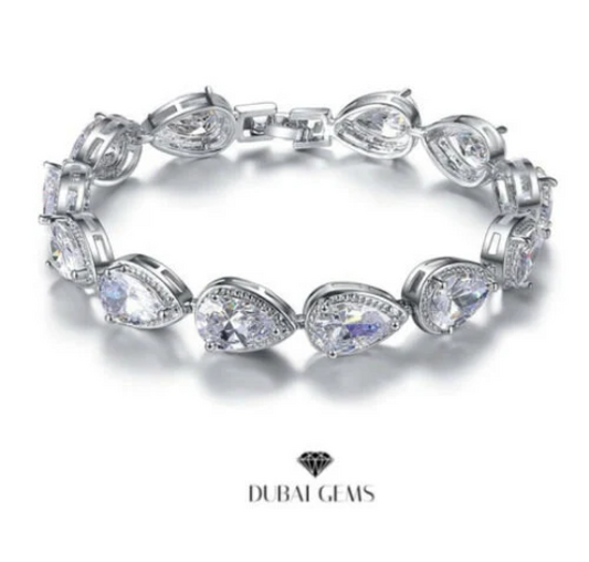 White gold finish created diamond pear cut tennis bracelet in luxury black box