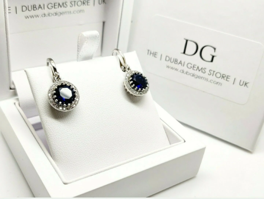 White gold finish blue sapphire and created diamond round cut droplet earrings