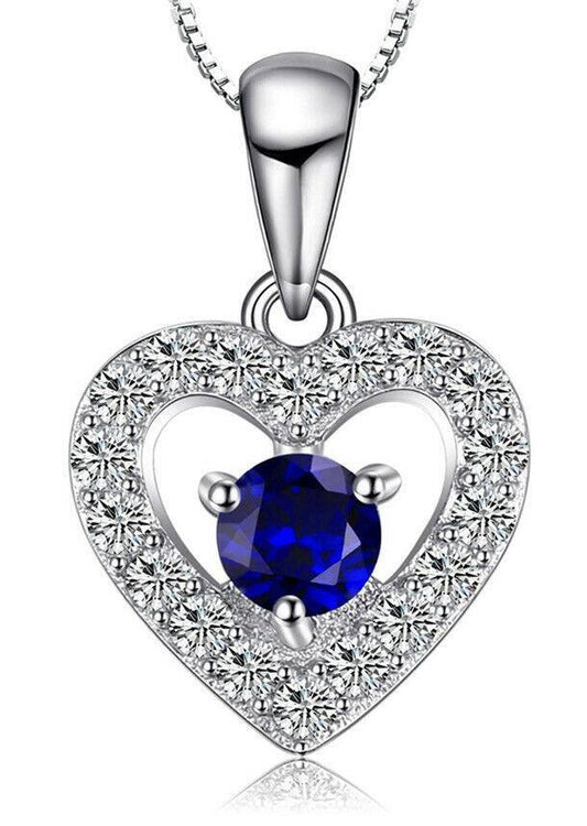 White gold finish sapphire heart pendant and created diamond necklace
