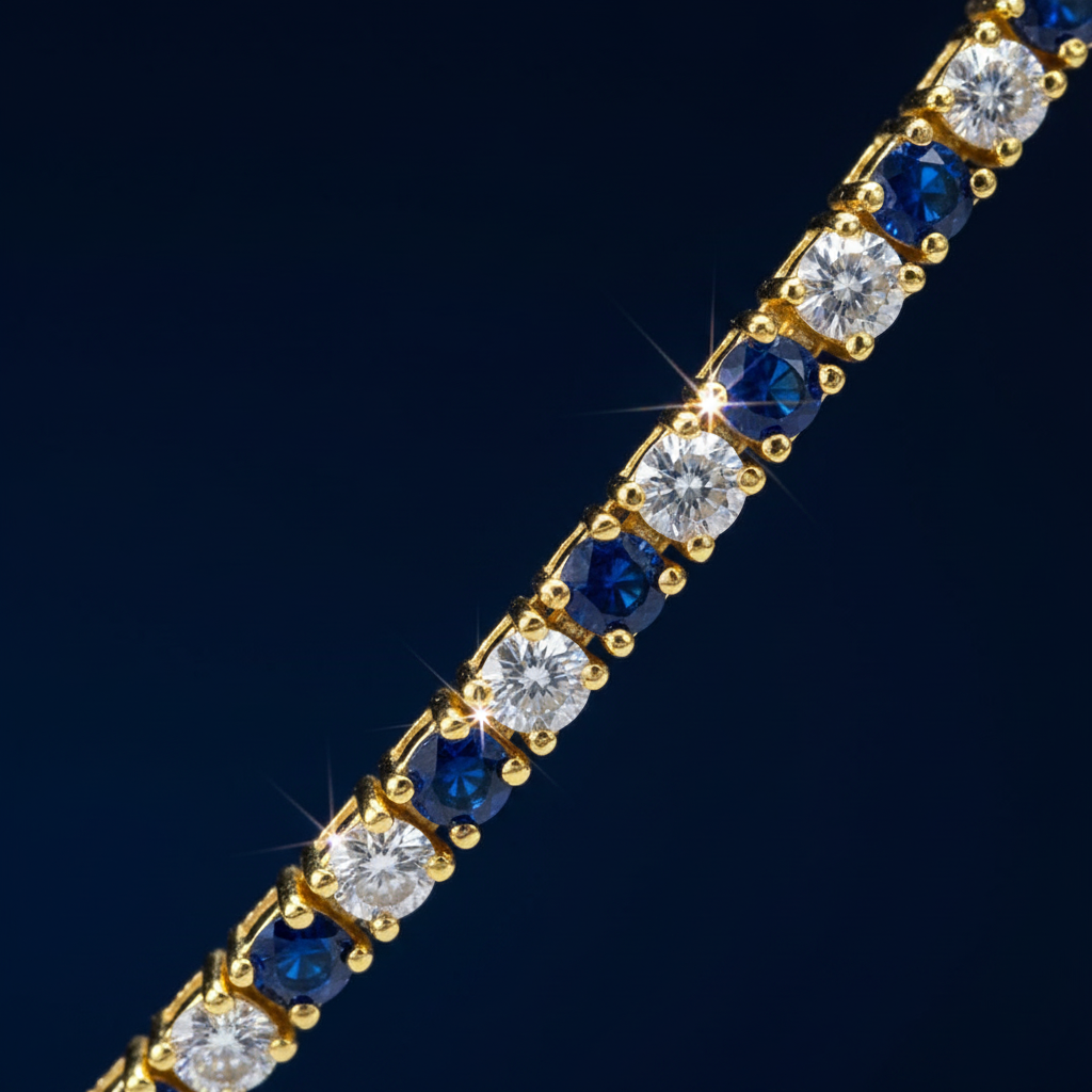 Close-up of round blue sapphires alternating with created diamonds in yellow gold claw settings