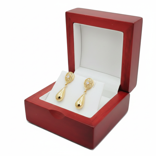 Red woodland matte jewellery box open with gold earrings inside white cushioned interior