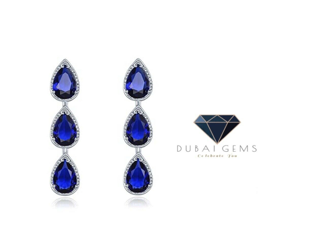 White gold finish blue sapphire pear cut and created diamond droplet earrings (Buy 1 Get 1 Free)