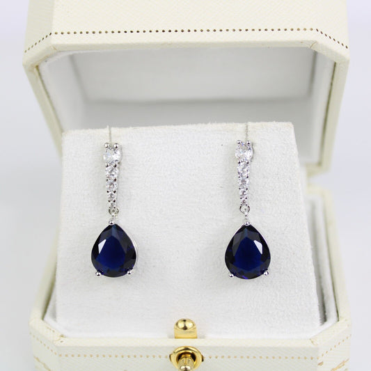 White Gold Finish Blue Sapphire Pear-Cut Dangle Earrings with Created Diamonds – Elegant & Timeless Jewellery