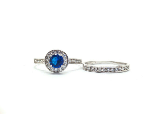 White gold finish blue sapphire created diamond ring