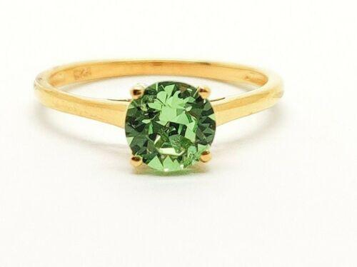 Yellow gold finish green peridot solitaire and created diamond ring